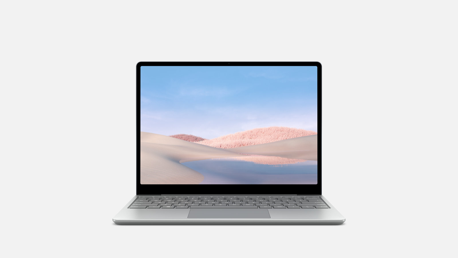 Een open Surface Laptop Go vanaf de voorkant met een landschap op het scherm.