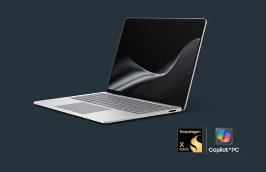 A Surface Laptop for Business in the colour Platinum.