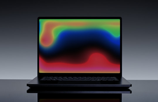 The colorful 15-inch Mini-LED PixelSense™ Ultra touchscreen of a Surface Laptop Ultra for Business.