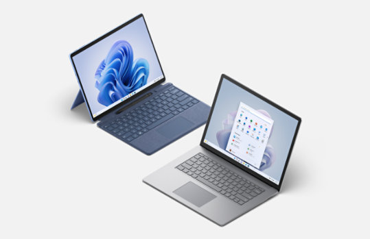 A Sapphire Surface Pro 9 and Platinum Surface Laptop 5 with Windows 11 screens
