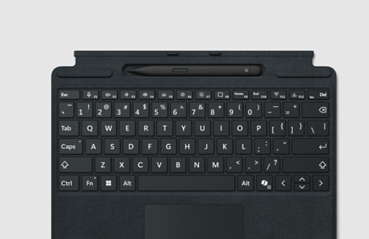 A top-down view of a Surface Pro Keyboard with pen storage with optional bold keyset.