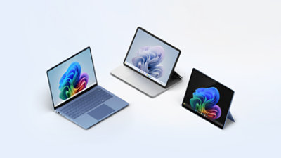 A Surface Laptop Copilot plus PC, a Surface Pro Copilot plus PC tablet and a Surface Laptop Studio 2. 
