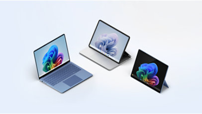 A Surface Laptop Copilot plus PC, a Surface Pro Copilot plus PC tablet and a Surface Laptop Studio 2.