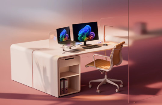A stylized desk setup with two laptops or displays in a pink and coral workspace.