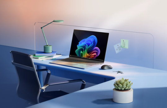 A laptop on a modern desk with a lamp, chair, and small potted plant in a blue-toned workspace.