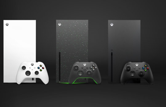 A white Xbox Series S, and a Xbox Series X Galaxy Edition, and a black Xbox Series X.