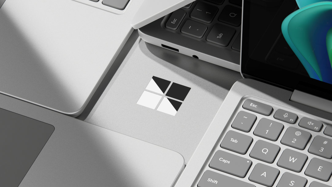 An image that shows a closeup of the Windows logo on a Surface chassis
