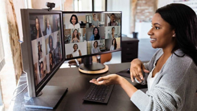 A person on a Teams video call with many other participants.