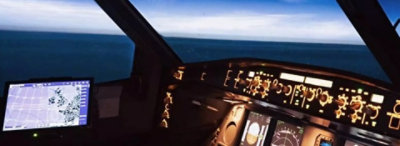 A view of the horizon from the cockpit of a plane.