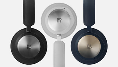 Beoplay Portal hörlurar i svart, Grey Mist och Navy.