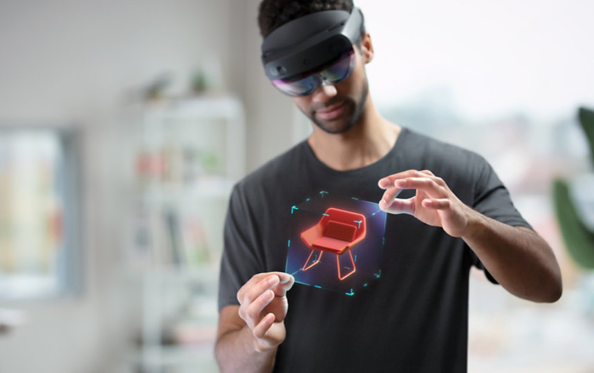 Person interacting with HoloLens 2. 