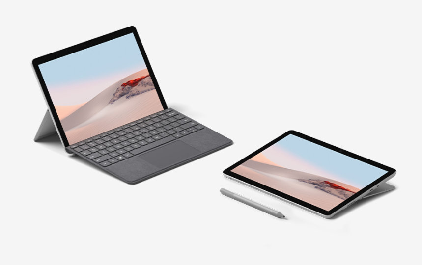 Two Surface Go 2 devices with Type Covers and a Surface Pen.