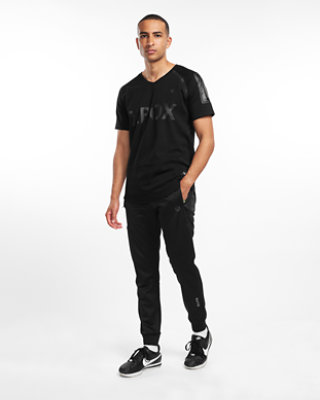 Angled view of male model wearing Xbox Elite Joggers
