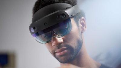 A man wearing a Microsoft HoloLens glass