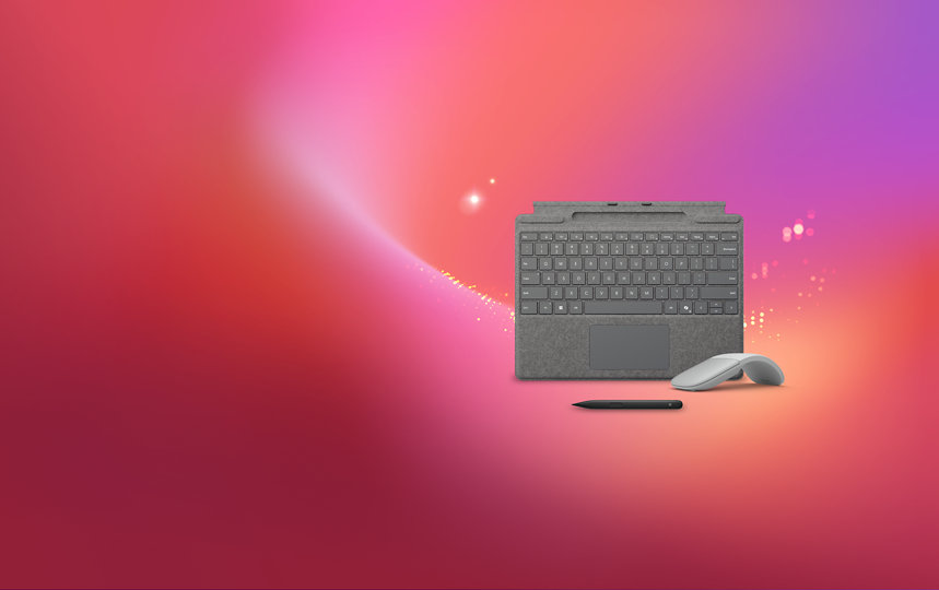 A Surface keyboard, Arc mouse, and slim pen.