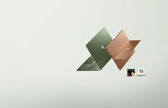 The latest edition Surface PCs—a floating Surface Laptop in the color Jade and a floating Surface Pro in the color Dune.