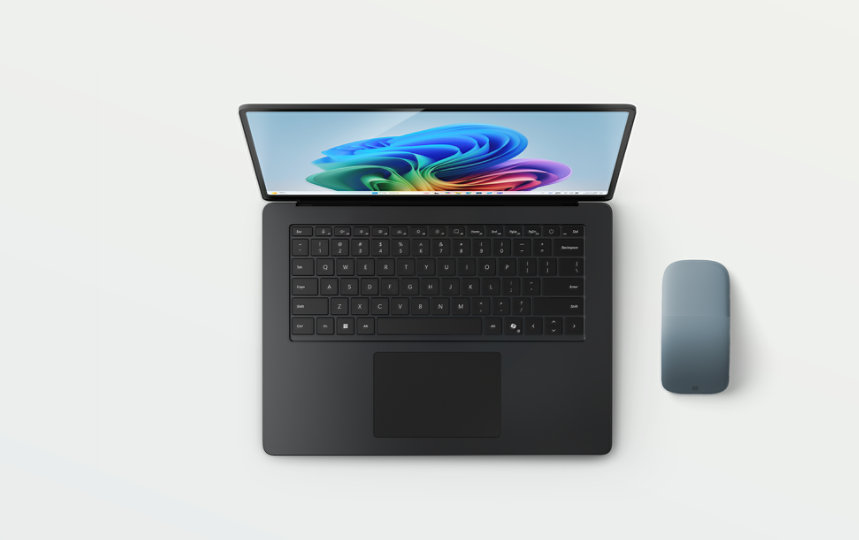 A black, 15-inch Surface Laptop with an Ocean Surface Arc Mouse.