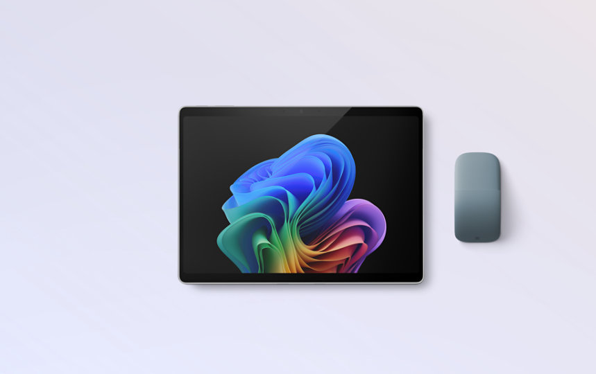 A platinum, 13-inch Surface Pro with an Ocean Arc Mouse.