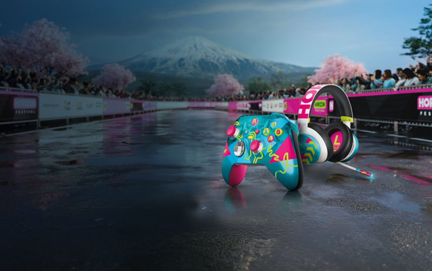 Kontroler Xbox Wireless Controller i zestaw słuchawkowy Xbox Headset w limitowanej edycji Forza Horizon 6, umieszczone na torze wyścigowym z górą Fuji w tle.