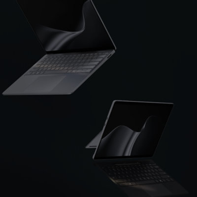The latest edition Surface PCs, back-to-back and floating—a Surface Laptop  and a Surface Pro, both in the color Platinum.