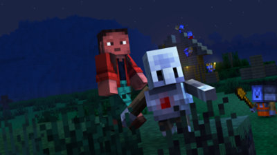 Two Minecraft characters run through a village at night