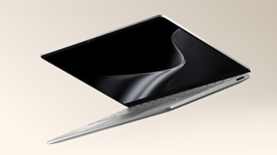 亮铂金 13.8 英寸 Surface Laptop 悬浮展示。