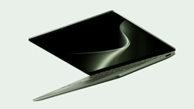 A floating 13.8-inch Surface Laptop in the color Jade.