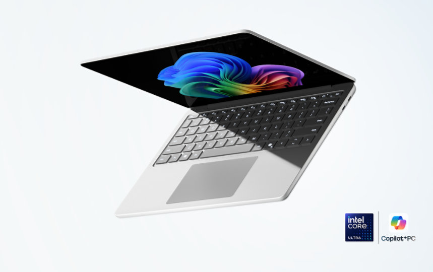 A 13-inch Surface Laptop for Business, a Copilot+ PC with Intel® processors, in the color Platinum floating at an angle.