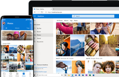 A mobile device and a tablet or laptop displaying folders and files in OneDrive