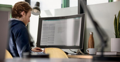 A person working at a desk in an office