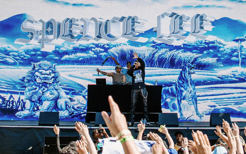 Spence Lee performs at a music festival.