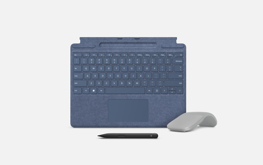 A Surface Pro Signature Keyboard in Sapphire with an Arc Mouse in Light Grey and Slim Pen 2.