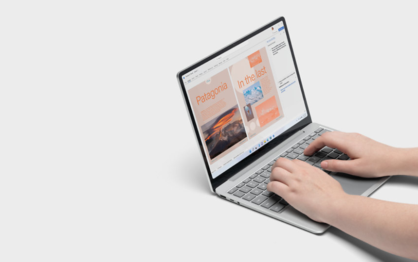 A person uses the Word app on a Surface Laptop Go 2 for Business.