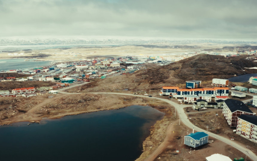 A sweeping view of a community in Nunavut in the Canadian Arctic.