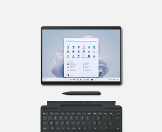 A Platinum Surface Pro 9 tablet with a Surface Slim Pen and a Black Surface Pro Signature Keyboard.