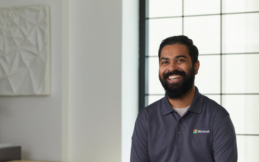Microsoft business consultant smiling into camera.