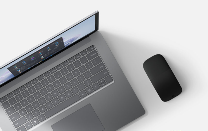 A platinum Surface Pro 5 and a black Arc Mouse.