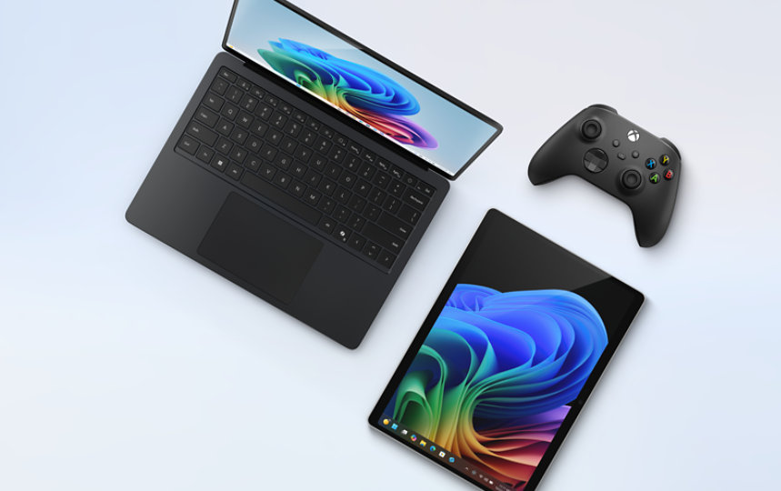 Surface Pro Copilot + PC und Tastatur neben einem Xbox-Controller.