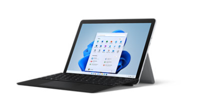 Surface Go 3 showing illustration of cityscape and leaves partially drawn.