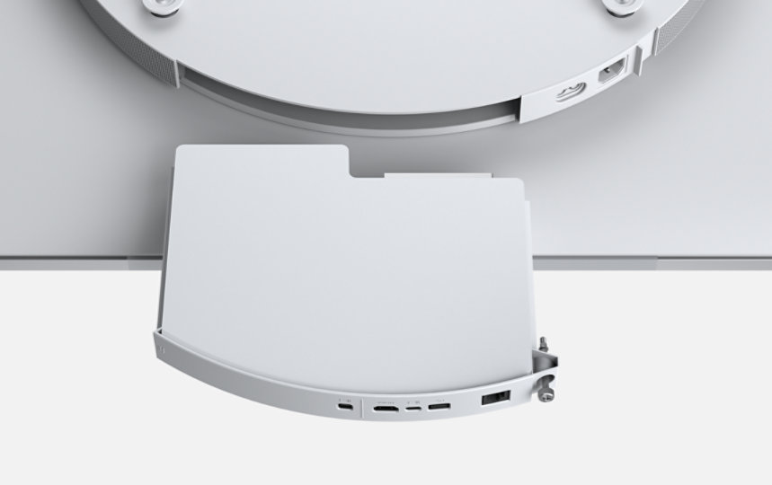 Microsoft Surface Hub 3 Compute Cartridge being inserted into the rear of a Surface Hub display