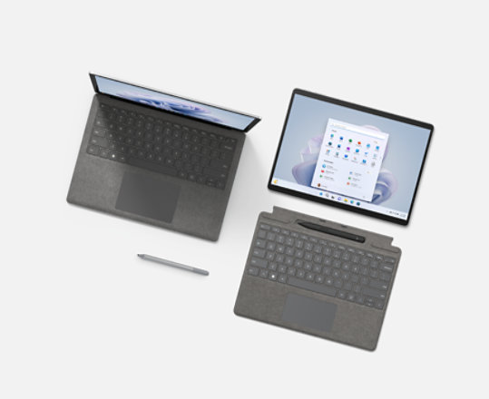 A Surface Laptop 5 for Business, Surface Pro 9, Surface Signature Keyboard with Slim Pen 2 and Surface Pen.