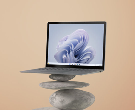 A Platinum Surface Laptop 5 with an alcantara keyboard