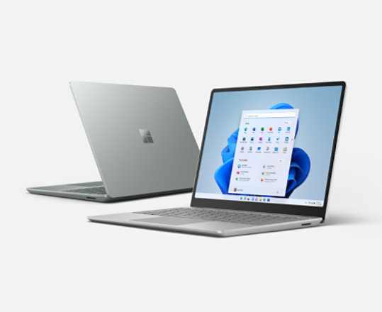 Two Surface Laptop Go 2 devices in the colors Platinum and Sage.