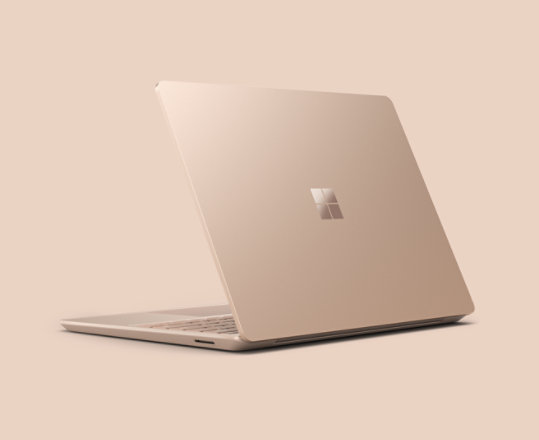 A Surface Laptop Go 2 for Business in the color Sandstone.