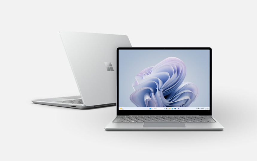 A front view of a Surface Laptop Go 3 and a back view of a Surface Laptop Go 3.