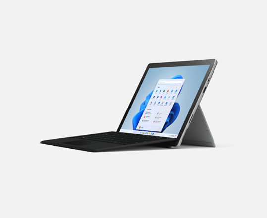 A Surface Pro 7 Plus with black type cover.