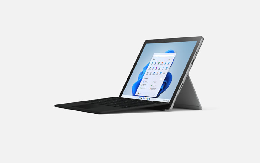 A Surface Pro 7 Plus with black type cover.