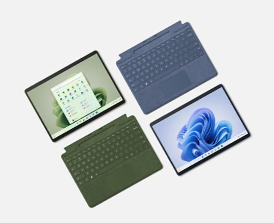 Un Surface Pro 9 con Type Cover en verde bosque y zafiro.