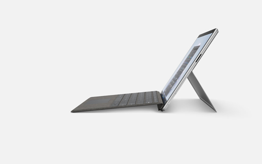 A side angle view of Surface Pro 9 for Business in Platinum.