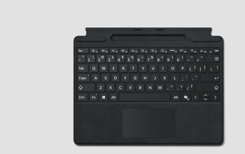 A top-down view of a Surface Pro Keyboard with pen storage for Business with optional bold keyset.
